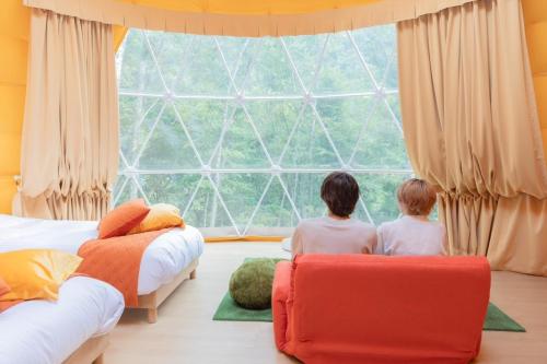Postel nebo postele na pokoji v ubytování Glamping Resort Venus