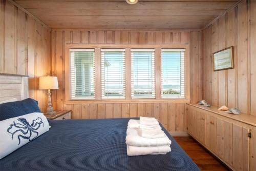 Postel nebo postele na pokoji v ubytování Duneside home