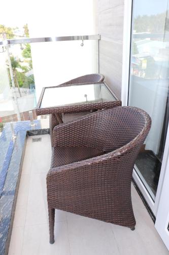 Qli Hotelにあるバルコニーまたはテラス