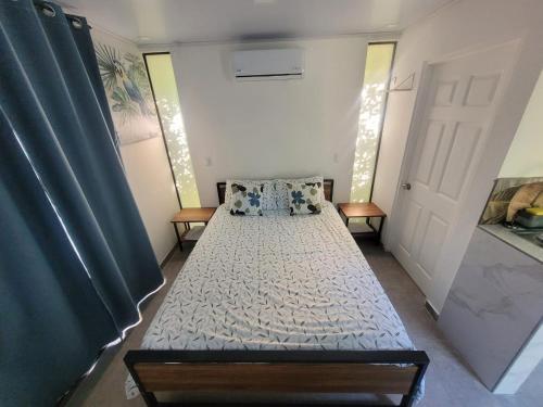 a bedroom with a bed in a room at Villa Rios in Talamanca