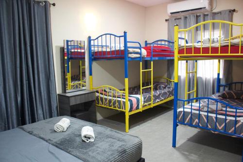 Ένα ή περισσότερα κρεβάτια σε δωμάτιο στο Chatek Family Inn