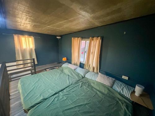 Postel nebo postele na pokoji v ubytování Stylish Loft Near Masa San Juan