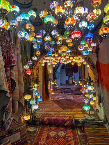 a room filled with lots of colorful lights at Hanzade Cappadocia in Goreme