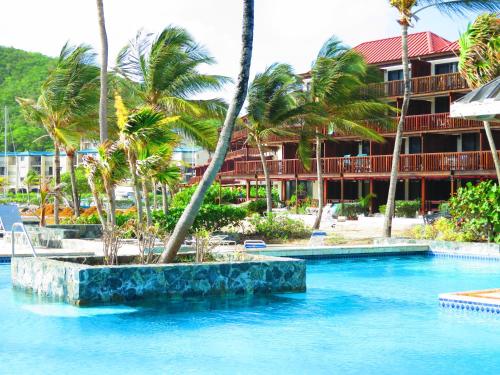 The swimming pool at or close to 2BR Luxury Beachfront Duplex Villa on Sapphire Beach III