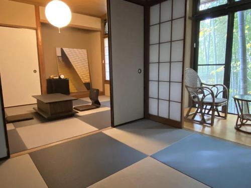 Postel nebo postele na pokoji v ubytování 阿部倉温泉 Abekura Onsen