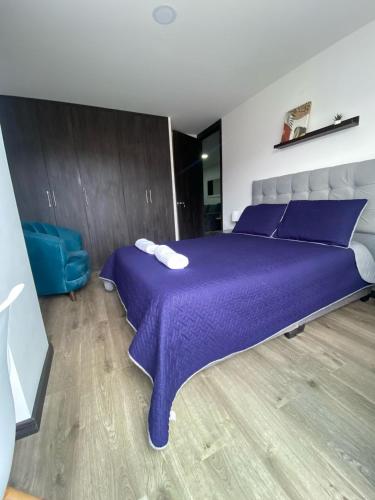Postel nebo postele na pokoji v ubytování exclusivo apto sector Unicentro y calle 27 senda del Carnaval