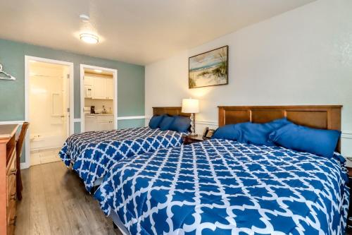 Ένα ή περισσότερα κρεβάτια σε δωμάτιο στο Belfair Motel