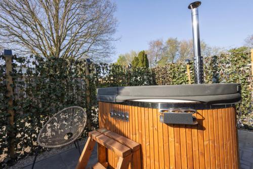 Φωτογραφία από το άλμπουμ του Tiny Wellness House in Heinkenszand with a private sauna, hottub, garden, airco, free wifi, boutique design and a luxury wellness experience σε heinkenszand