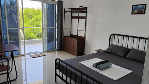 Postel nebo postele na pokoji v ubytování Palma Resort