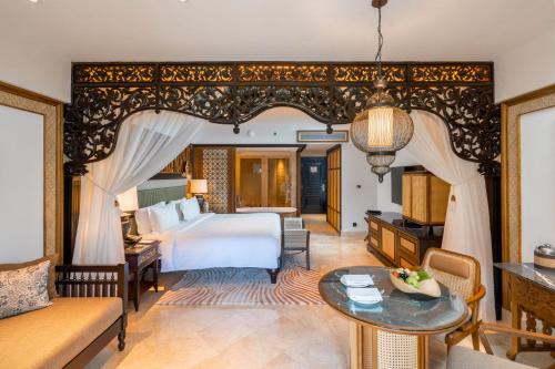 Postel nebo postele na pokoji v ubytování AYANA Resort Bali