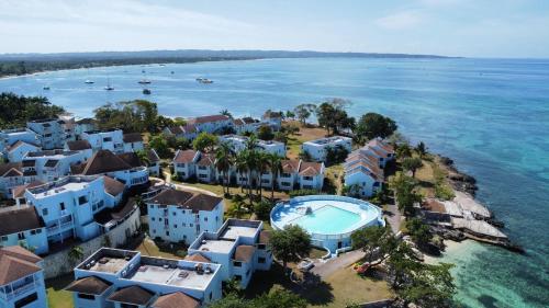 an aerial view of a resort and the ocean at Negril beachfront oceanview studios 164 & 145 in Orange Bay