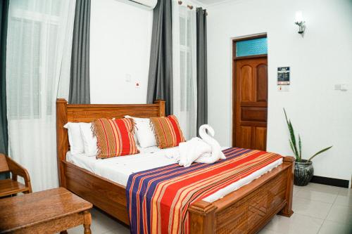 Postel nebo postele na pokoji v ubytování 64 ZENJ HOUSE Luxury AIRPORT HOTEL