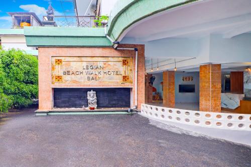 a building with a sign that reads beer way tofu bar at Townhouse Oak Legian Near Kuta Beach Formerly Sayang Maha Merta in Legian
