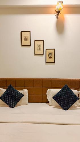 Postel nebo postele na pokoji v ubytování Hotel Nikanshvee