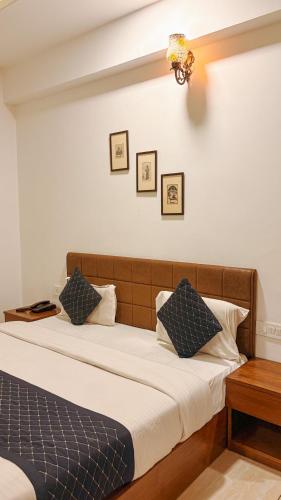 Postel nebo postele na pokoji v ubytování Hotel Nikanshvee