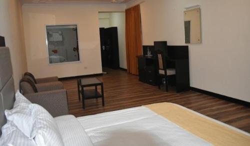 Ein Bett oder Betten in einem Zimmer der Unterkunft Hotel Choskor