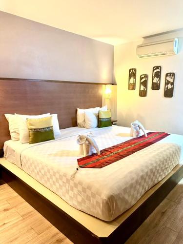 BB Mantra Boutique Hotelにあるベッド