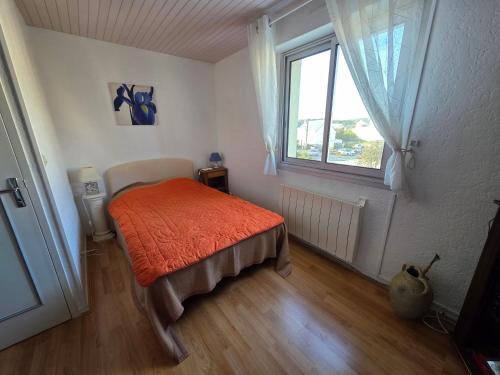 Postel nebo postele na pokoji v ubytování Front de mer