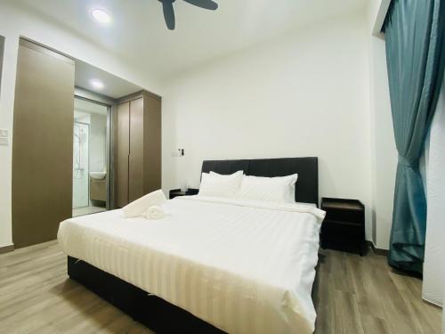 Postel nebo postele na pokoji v ubytování Agile Bukit Bintang TRX KL City Center Suite