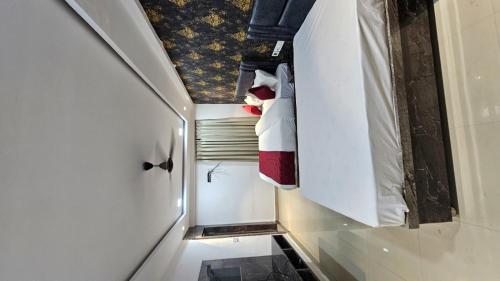 Postel nebo postele na pokoji v ubytování Hotel Park View Pithampur