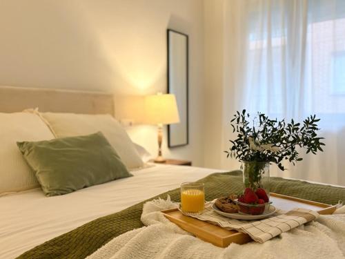 Ένα ή περισσότερα κρεβάτια σε δωμάτιο στο ChillaHomes 104