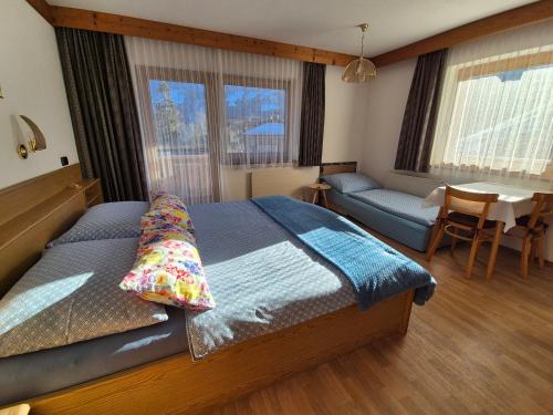 Postel nebo postele na pokoji v ubytování Haus Klammtal