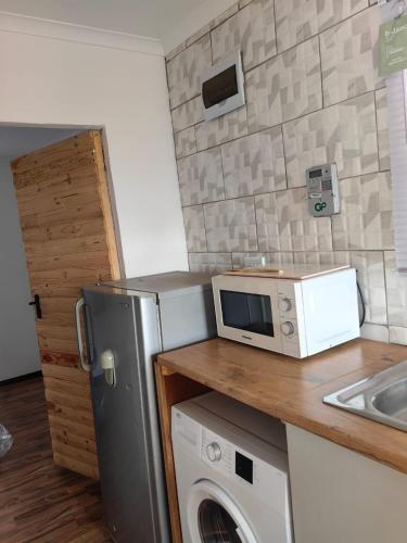 Kuchyň nebo kuchyňský kout v ubytování Cabin in Pretoria West