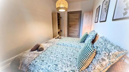 Postel nebo postele na pokoji v ubytování Appartement Sylvinite