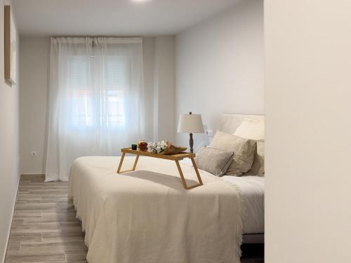 Ένα ή περισσότερα κρεβάτια σε δωμάτιο στο ChillaHomes 201