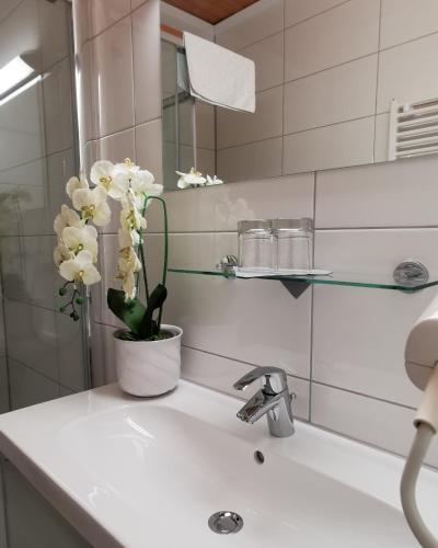 Un baño de Hotel Am Greiner