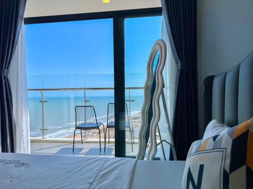 Una cama o camas en una habitación de CSJ TOWER - CSJ Apartment Luxury SeaView Vung Tau City - Căn Hộ Du Lịch Biển Vũng Tàu