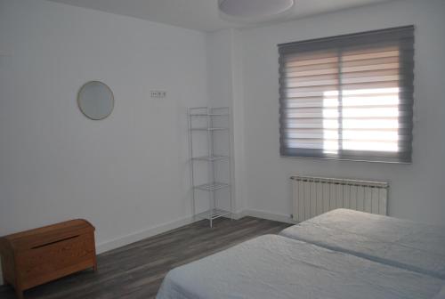 Ένα ή περισσότερα κρεβάτια σε δωμάτιο στο Casa El Chasquín
