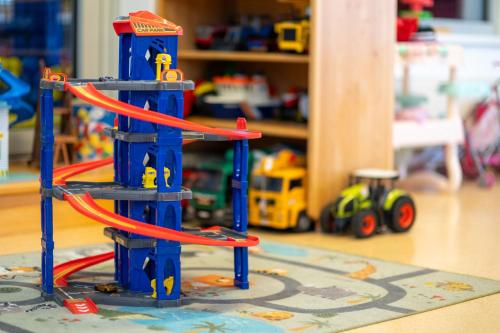 a toy set of stairs with a toy train at Hotel Xylophon - inklusive Thermeneintritte in Lutzmannsburg