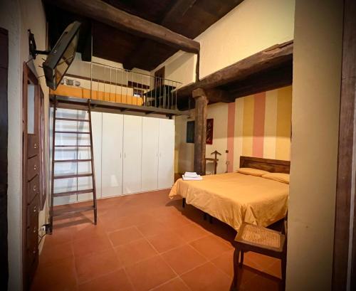 En eller flere senge i et værelse på Casa La Corte