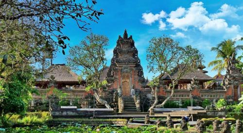 a building with stairs in front of it at Calma Ubud Suite & Villas - Rice Fields View, Infinity Pool ! in Ubud
