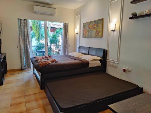 Кровать или кровати в номере Casa Philomena