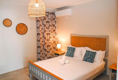 Postel nebo postele na pokoji v ubytování Bois Mapou Self Catering Apartments Unit 101