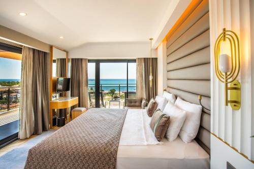 Postel nebo postele na pokoji v ubytování Alexia Resort & Spa - Ultra All Inclusive Adult Only