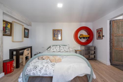 Postel nebo postele na pokoji v ubytování La Fabriqueta Apartament