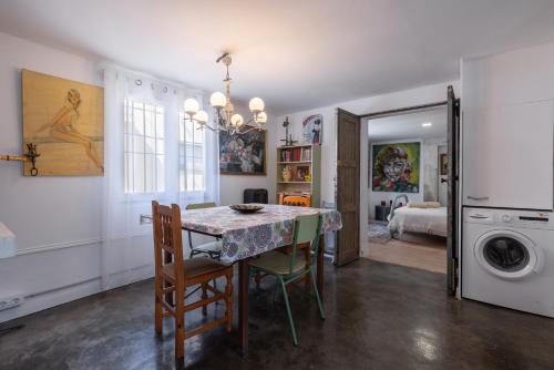 Postel nebo postele na pokoji v ubytování La Fabriqueta Apartament