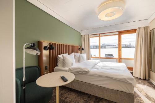 Postel nebo postele na pokoji v ubytování Imperial Hotel