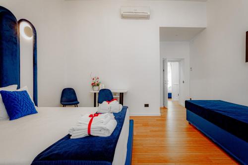 Postel nebo postele na pokoji v ubytování Historical Center