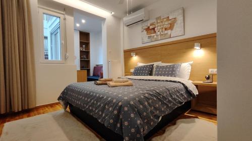 Ένα ή περισσότερα κρεβάτια σε δωμάτιο στο Thess1home Stellar