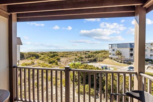 a balcony with a view of the ocean at Southwinds G10 Ocean View condo in Atlantic Beach