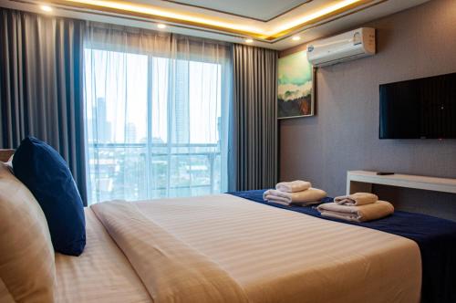HT9 Hotelにあるベッド