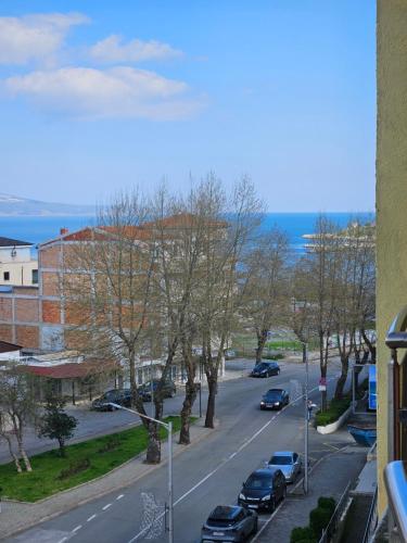a view of a street with cars parked on the road at Julia Vigo Panorama apartments in Nesebar