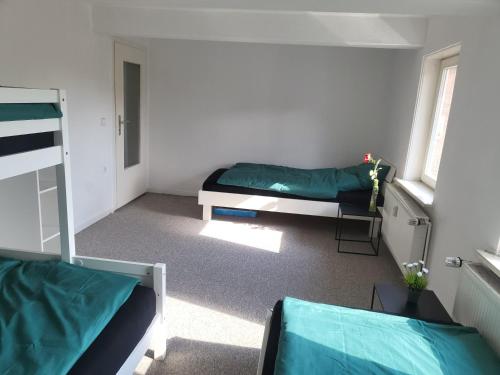 Katil atau katil-katil dalam bilik di Sunny Rooms