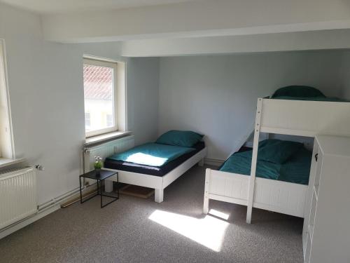 Katil atau katil-katil dalam bilik di Sunny Rooms
