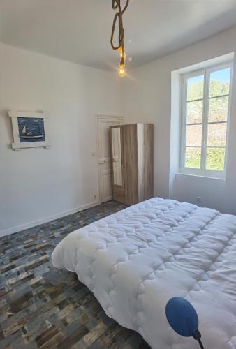 Postel nebo postele na pokoji v ubytování Domaine Duchentyls Chambres d hotes