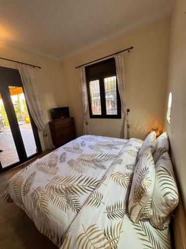 Cama o camas de una habitación en Splendide Villa avec piscine